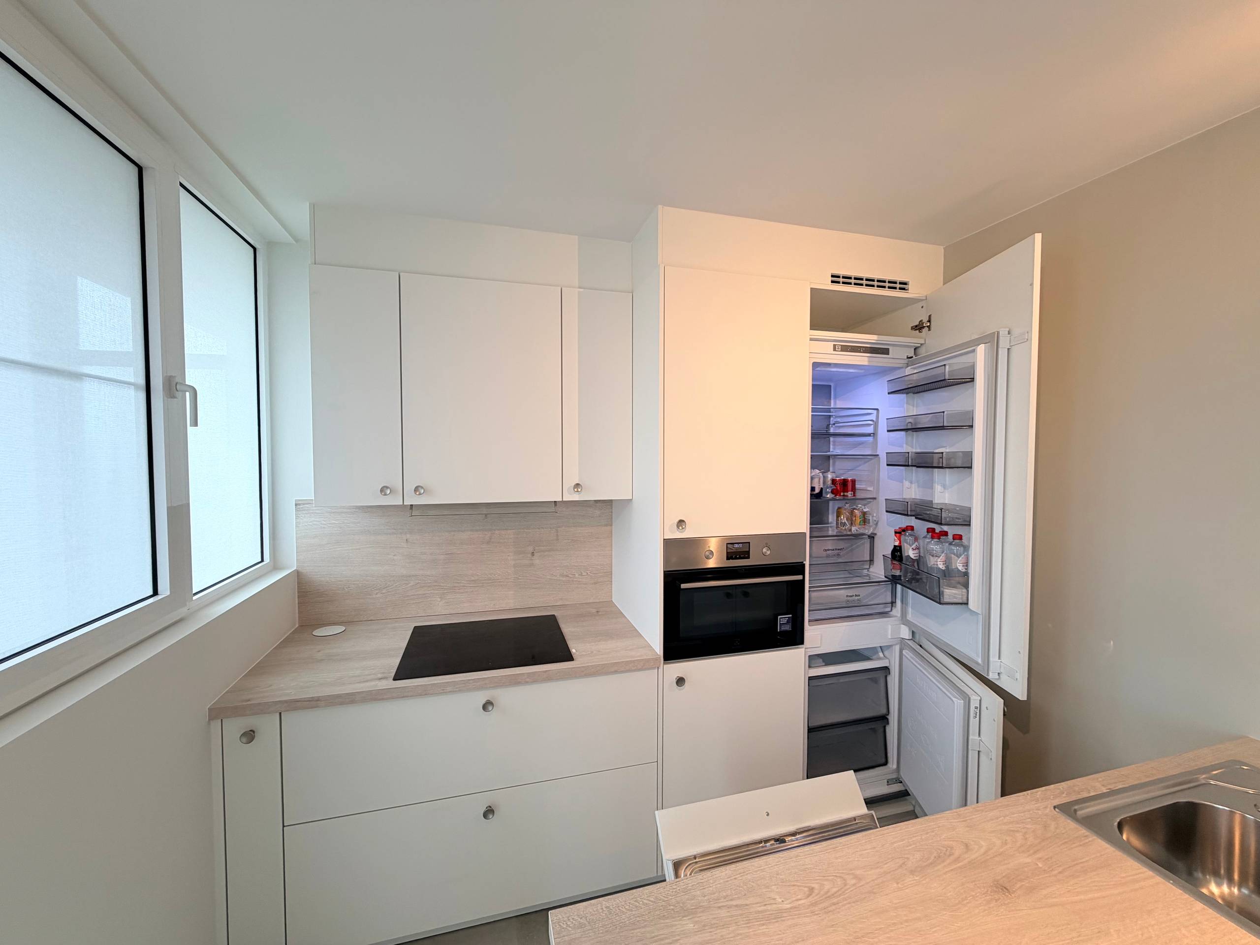 Genk - centrum : Volledig gerenoveerd, ruim en centraal gelegen appartement met 3 slaapkamers en 2 terrassen. - foto 4