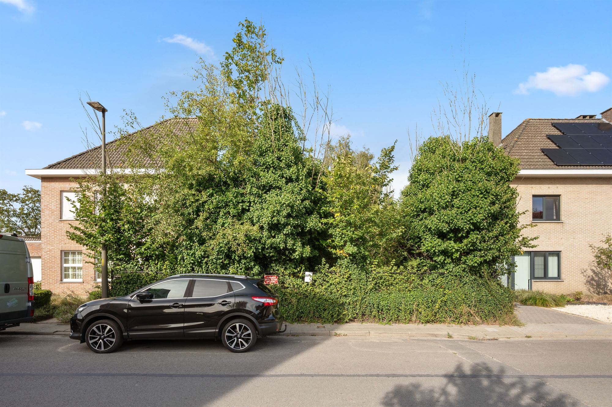 Bouwgrond voor halfopen bebouwing met straatbreedte van 12m - foto 1