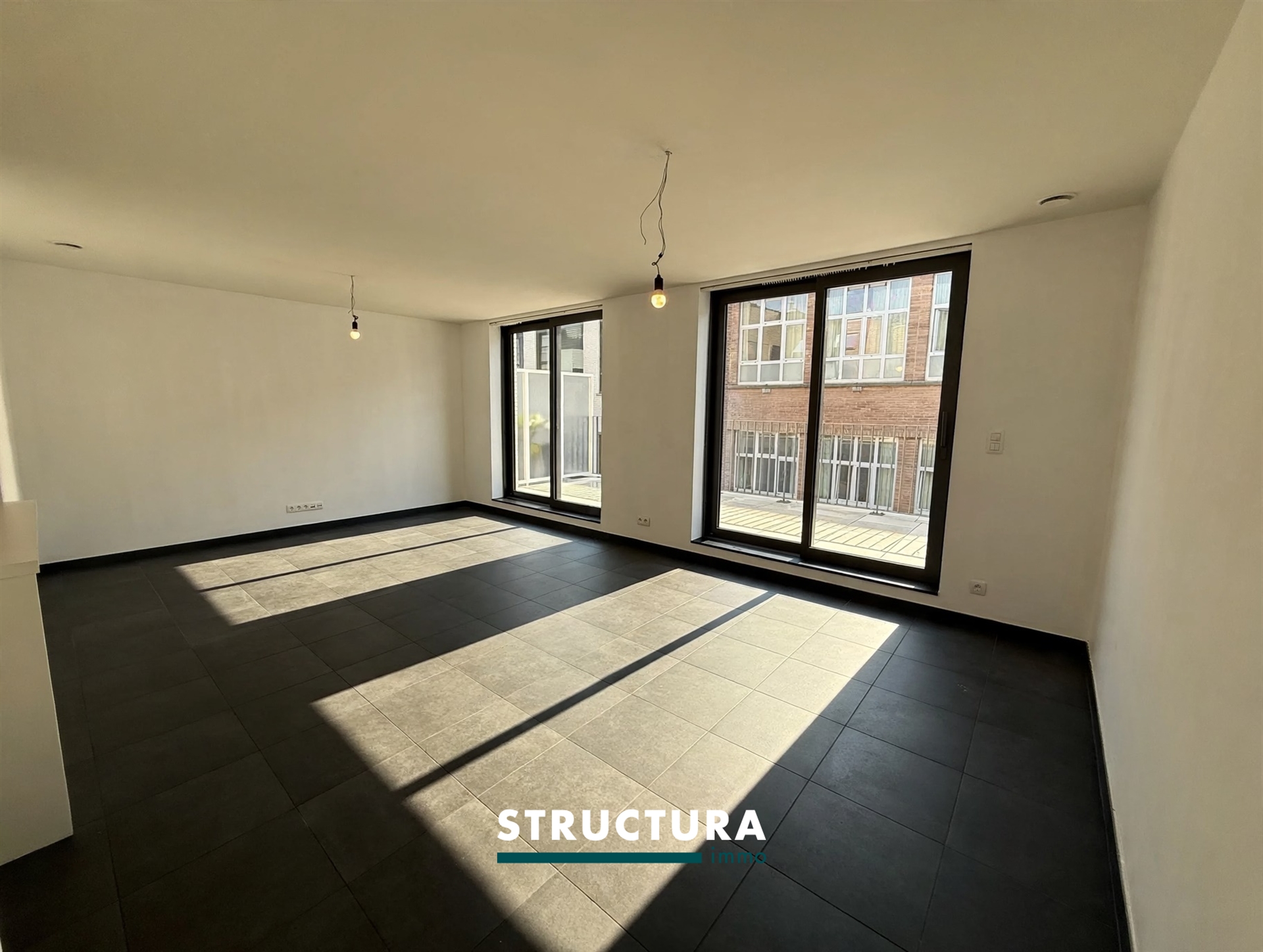Appartement + emplacement avec terrasse au centre - photo 2