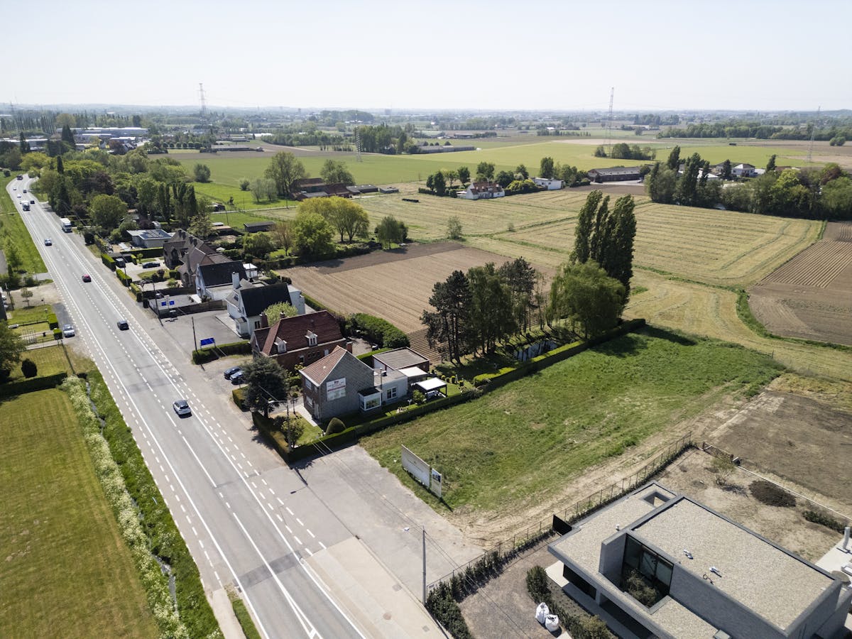 Lot bouwgrond (697 m²) + alleenstaande woning te koop Hulste - foto 4