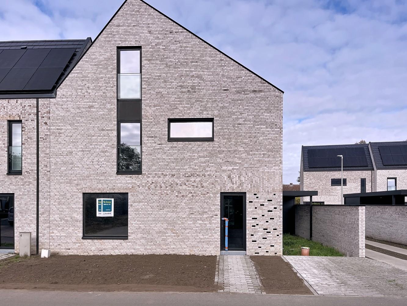 Halfopen bebouwing met 3 tot 5 slpks en carport - foto 1