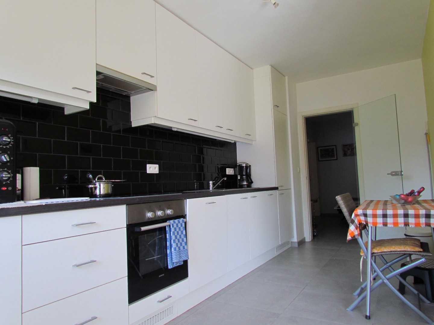 Ruim gelijkvloers appartement met tuin, terras en garagebox - foto 5