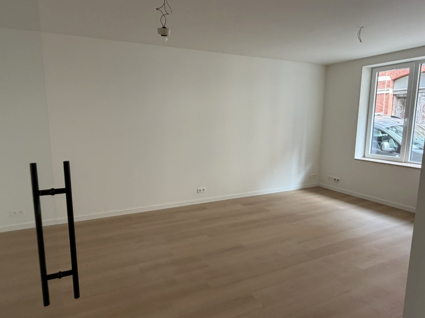 Gelijkvloers appartement met 2 slpk, koer en garagebox - foto 5