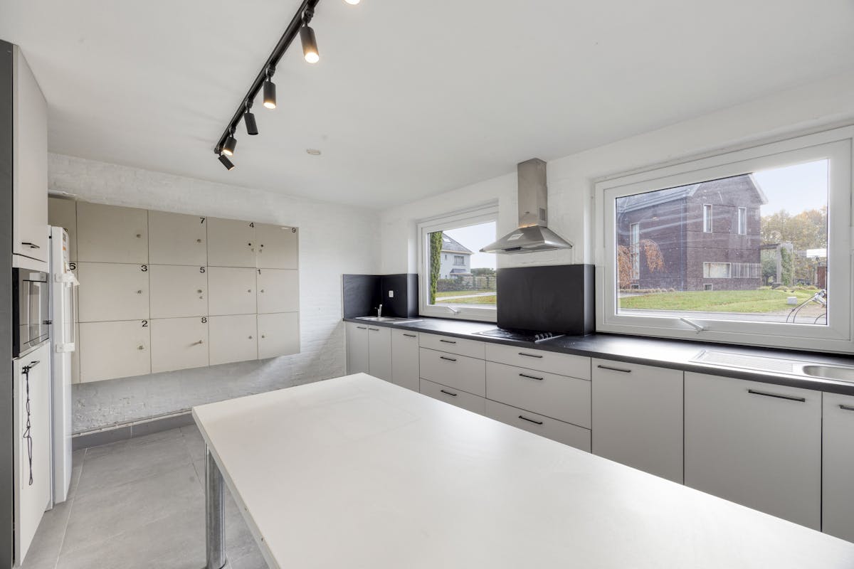 Opbrengsteigendom met 9 studentenkamers en duplex-appartement te Hasselt - foto 4