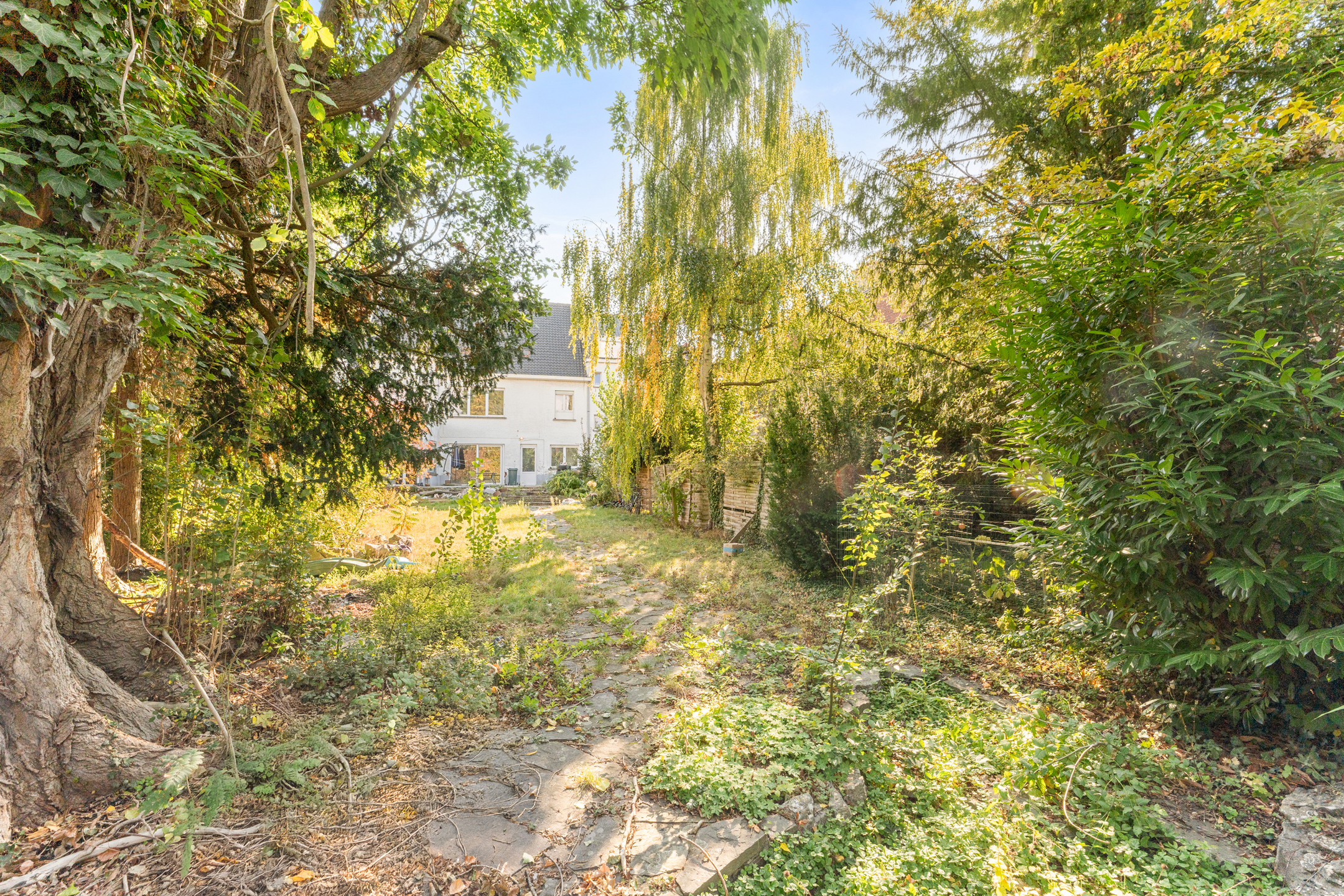 Charmante herenwoning met grote tuin en zonnepanelen.  - foto 2