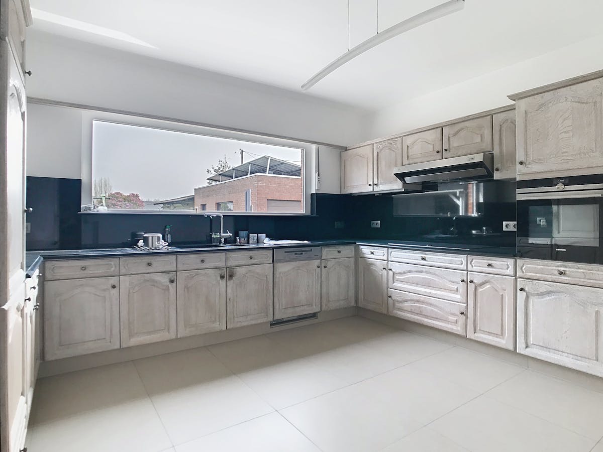 Huis te huur in Kruibeke met grote tuin - foto 5