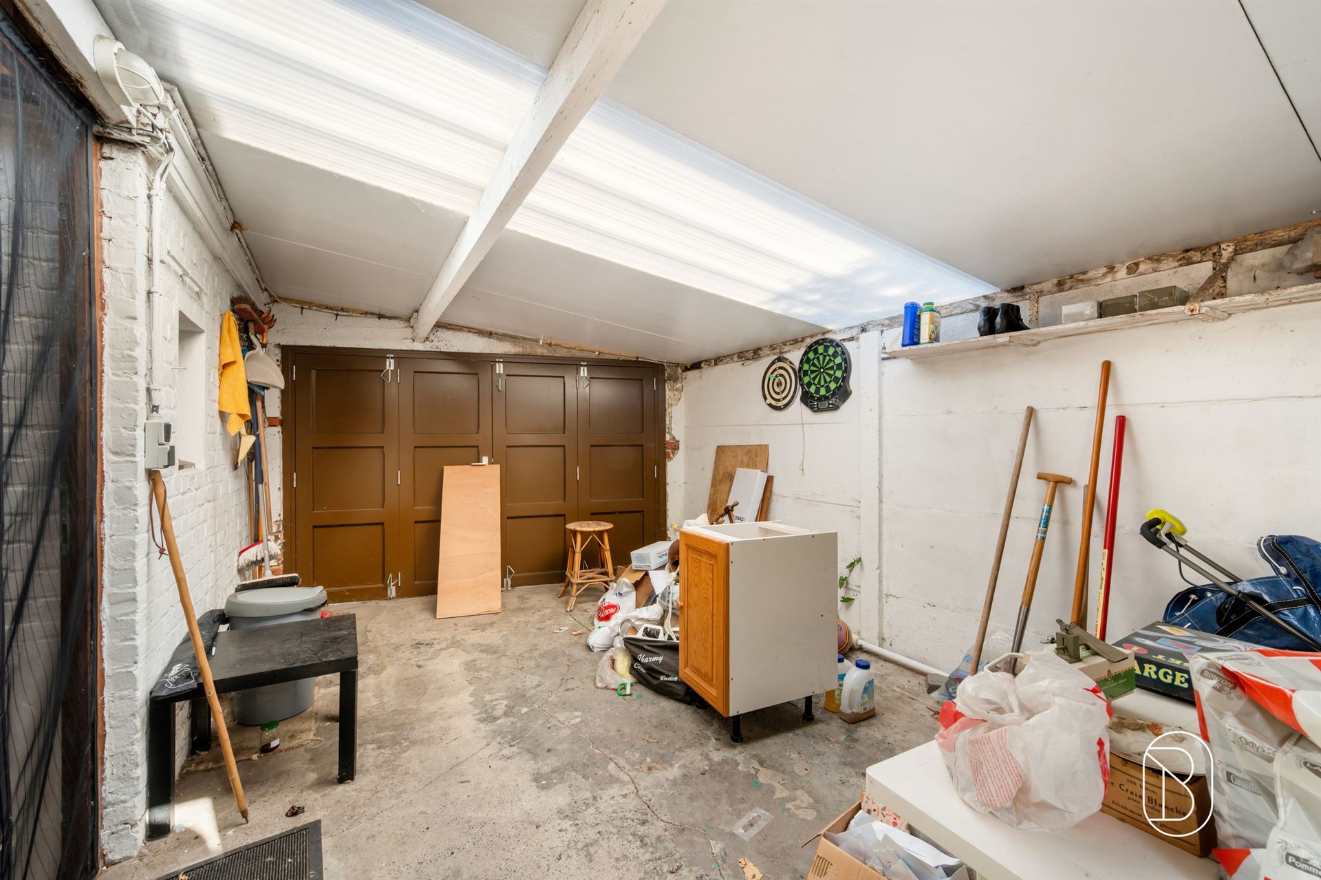 Degelijke woning met tuin en garage in het centrum - foto 4