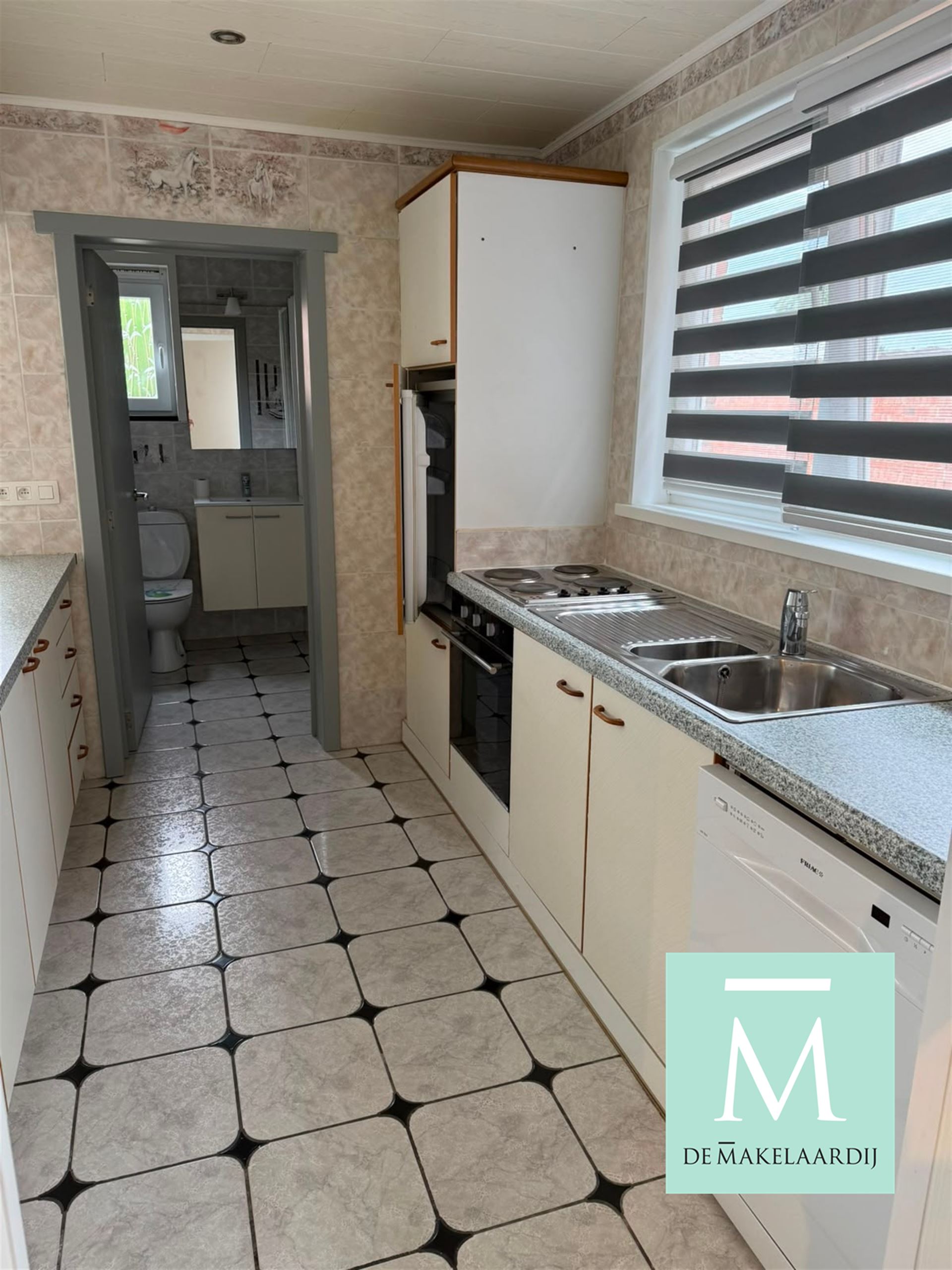 Instapklaar gelijkvloersappartement met 2 grote slaapkamers en tuin - foto 5
