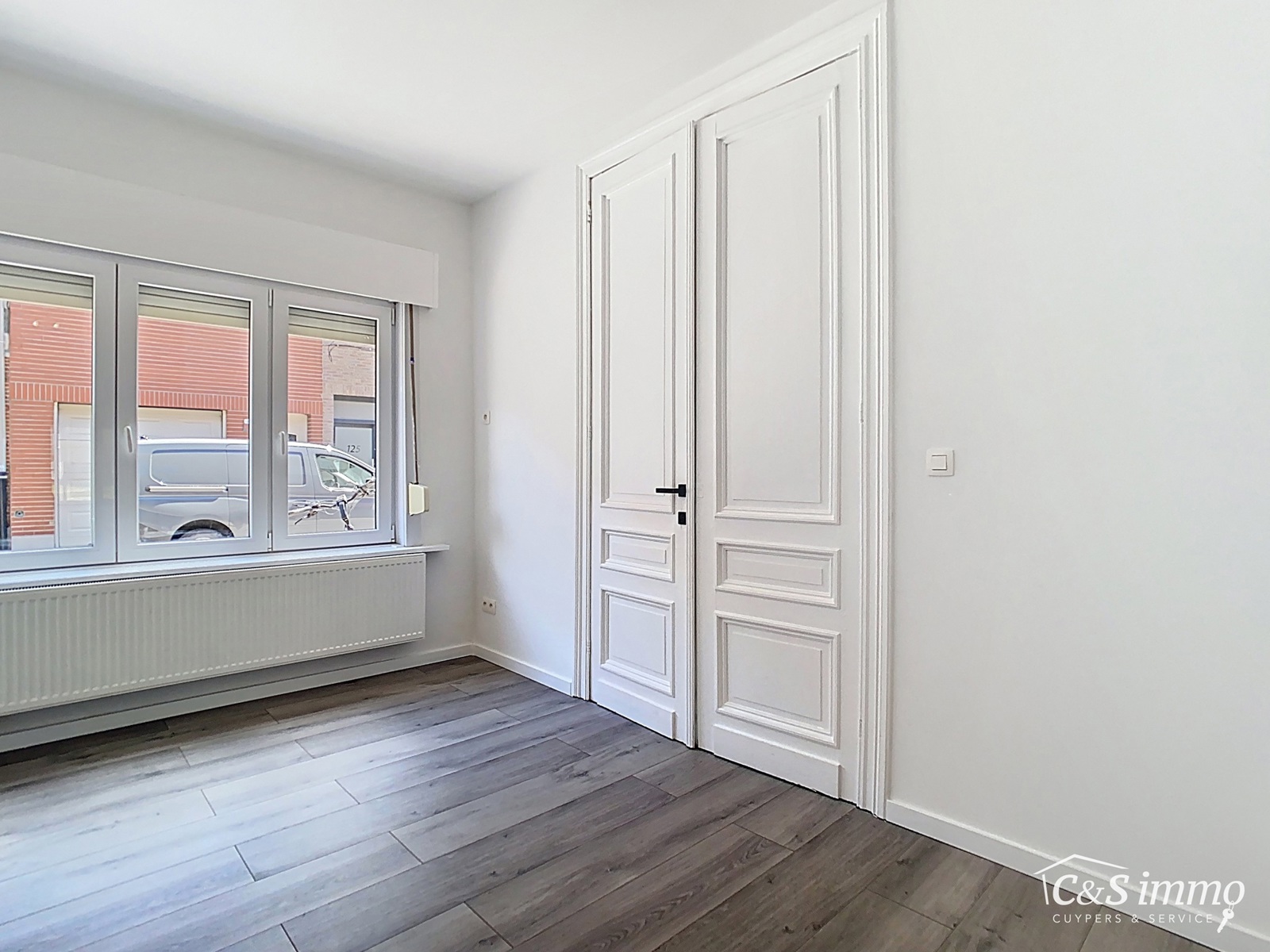Instapklare woning met ruime tuin en hobbyruimte - foto 2