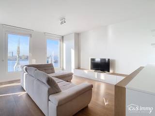 Hedendaags volledig gerenoveerd appartement (ca 75m²) met frontaal uitzicht op de Schelde in een monumentaal gebouw op het Eilandje. Woon- en...