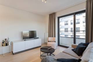 EVERE: Stijlvol en lichtrijk 2-slaapkamer hoekappartement met berging en overdekte staanplaats, gelegen in de onmiddellijke omgeving van NATO...