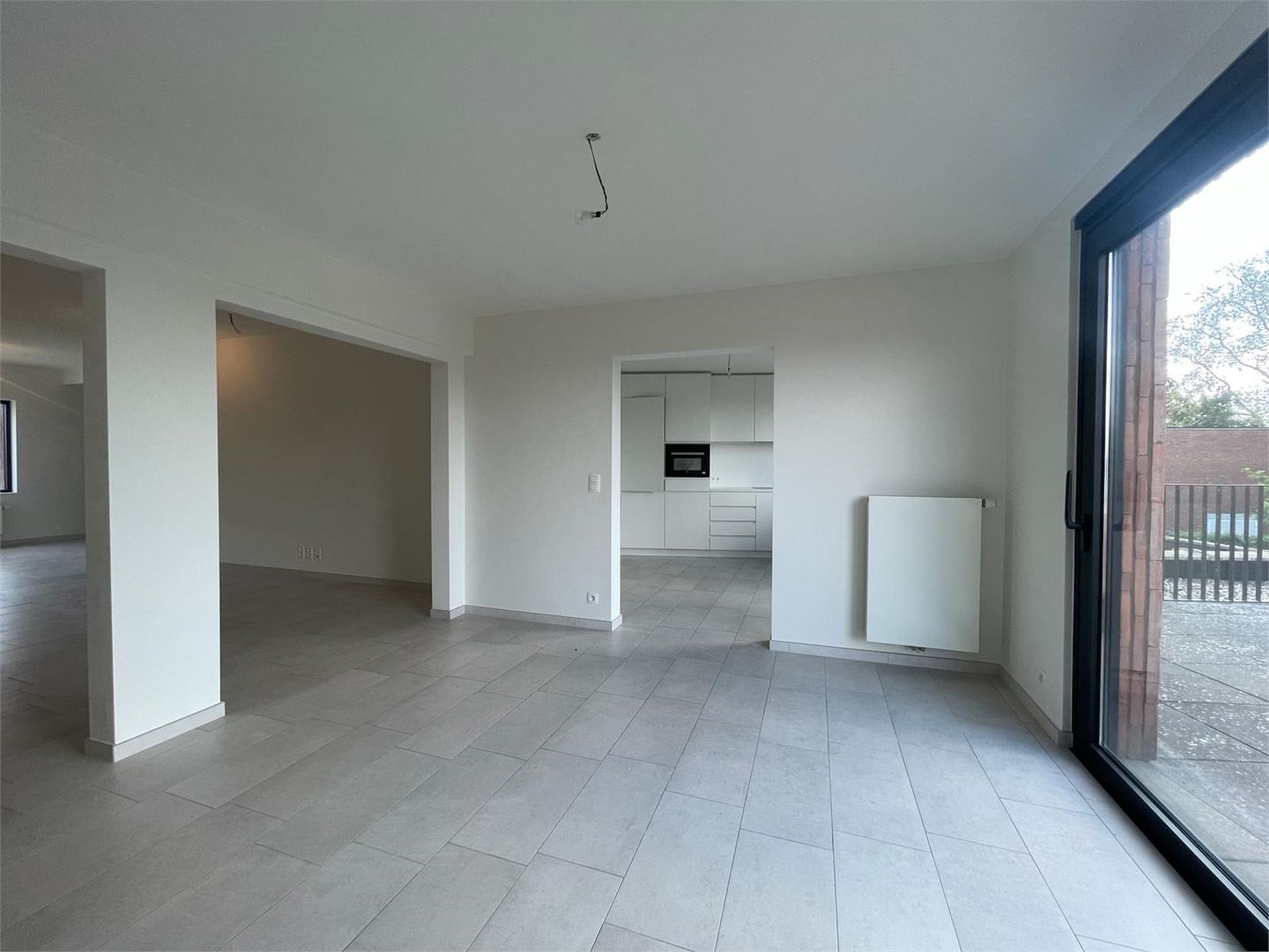 Duplex app met 3 slpks en tuin - foto 5