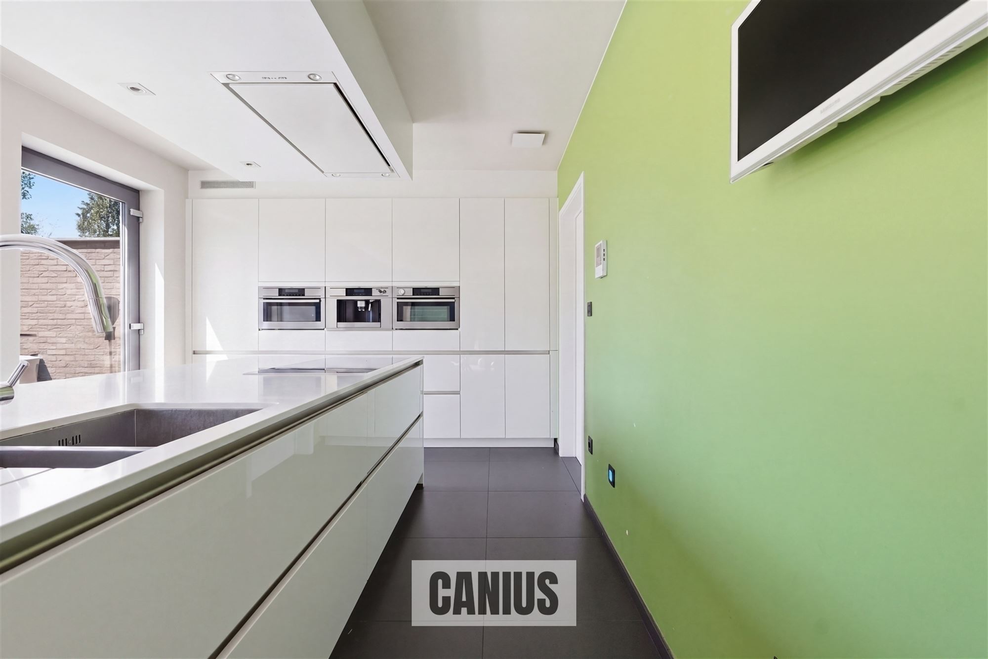 MODERNE, INSTAPKLARE WONING MET 3 SLPK EN ZUIDGERICHTE TUIN - foto 4