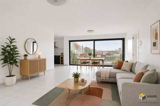 <p><span>Spacious apartment (110 m²) with 2 bedrooms and terrace (12 m²) in Antwerp (2020).</span></p><p><span>Living opposite Den Tir Shopping Center means enjoying stores, restaurants and numerous amenities nearby, combined with excellent accessibility. Thanks to the proximity of public transport, the velo-sharing system and important connecting roads, you can effortlessly move here to and around the city.</span></p><p><span>The apartment is located on the second floor of a well-kept building built in 2012, whose roof was insulated conformably. The fixed costs are approximately €140/month. Furthermore, the electricity is compliant and the aluminum windows are double-glazed.</span></p><p><span>With a living area of no less than 110 m², you will enjoy a particularly large amount of space and light here. Upon entering, there is a practical checkroom corner, as well as a separate toilet and a handy storage/laundry room (3 m²).</span></p><p><span>The bright living space with open, fully equipped kitchen forms the heart of the apartment and has a total area of about 50 m². Thanks to the large windows at the front and rear, you enjoy a pleasant open feeling and lots of natural light here. Through a sliding door you reach the southeast-oriented terrace of 12 m², where you can enjoy an open view of the surroundings.</span></p><p><span>Furthermore, the apartment has two full bedrooms of 10 m² and 15 m² and a bathroom of 7 m² with walk-in shower and washbasin cabinet.</span></p><p><span>Are you looking for a spacious and move-in ready apartment in a central location? Do not miss this opportunity! Living area 110 m² – ref: gross floor pop. For more info or a free estimate visit </span><span><span>www.hansimmo.be</span></span></p><p><span> </span></p>
