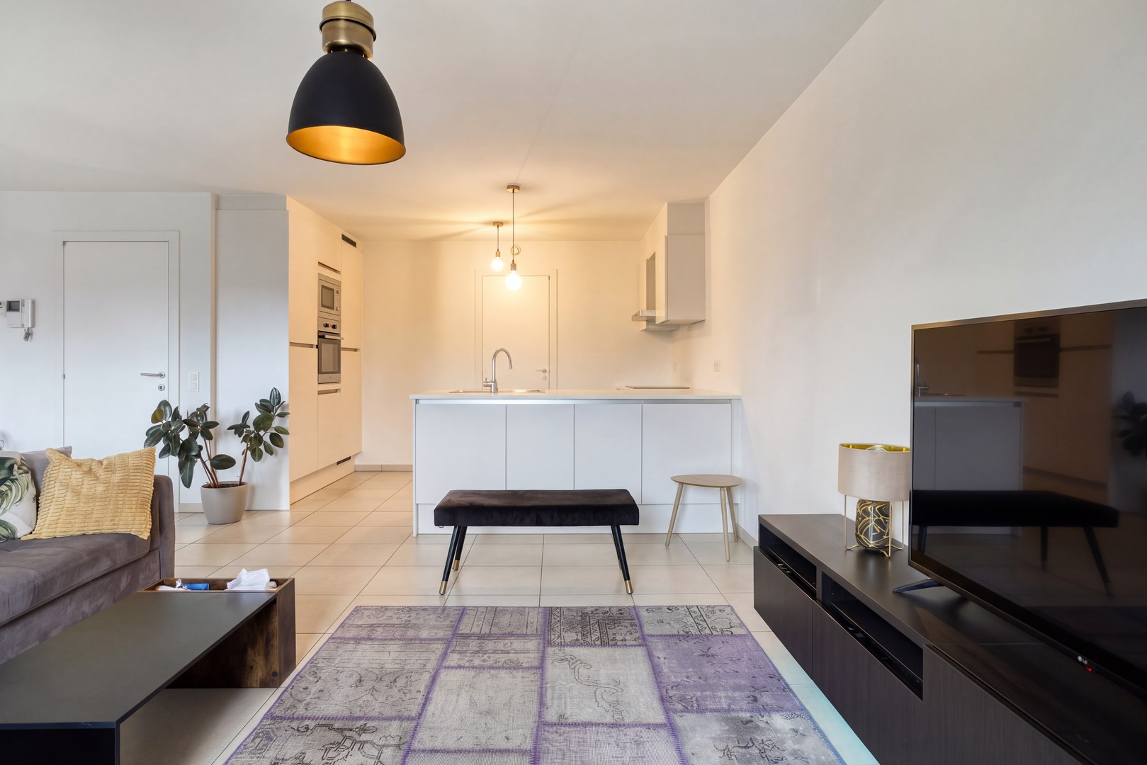Instapklaar en energiezuinig 2-slaapkamerappartement met garage nabij het centrum van Roeselare - foto 4