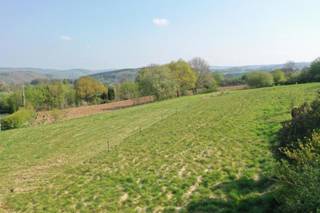 Grond: +/-12*100m met een bouwzone van 12*14m. Ideaal voor een vakantiewoning.