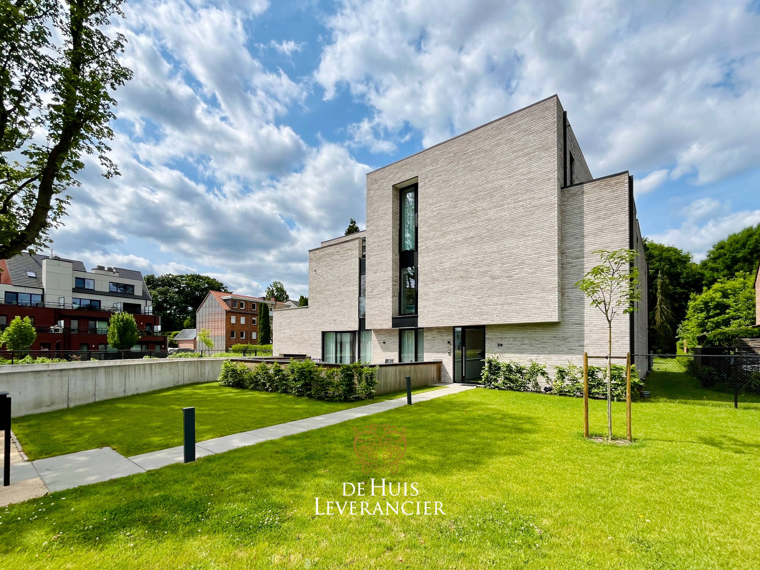 Discrete luxe & tijdloze elegantie : subliem nieuwbouwappartement met terras en gemeenschappelijk tuin te koop in Boechout - foto 2