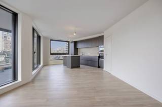 V1L Rivert new build apartment approx 110 m²General Features:- new build project in top location in Antwerp- terrace with unique views of the Scheldt and the Linkeroever marina - underfloor heating- microtopping and customization option- partly sales under registration, partly under VATLayout - entrance hall with separate toilet- living space with beautiful view of the Scheldt- open kitchen with island- storeroom- terrace with sliding windows- 2 bedrooms in the back- bathroom with bathtub and shower- accessible green roof Microtopping “Less is More”This new build project in Antwerp offers several additional options for finishing such as microtopping. Microtopping is a perfect choice for those who love a seamless surface, vertically or horizontally for a unique, elegant and modern look. An endless choice of colours, effects and finishes. Even MoreGoplus gives you even more options in Rivert, which is to fully customize the overall interior. This ranges from an integrated wood veneer wall to partitions, dressing and doors. The sky's the limit! Sales under VAT system.Are you interested in new construction, apartment or property for sale in Antwerp? Please don't hesitate to contact us.If you would like to offer your own property for sale please contact us for a non-binding estimate, by phone at 03/206.76.76 or by email to antwerpen@dewaele.com. You can also contact us for all other questions about real estate, buying or selling in Antwerp!