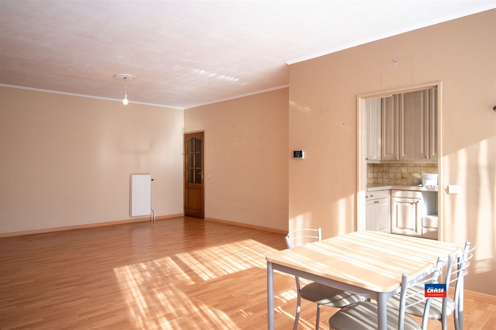 Gelijkvloersapp. met 2 slpks, tuin + garage - foto 4