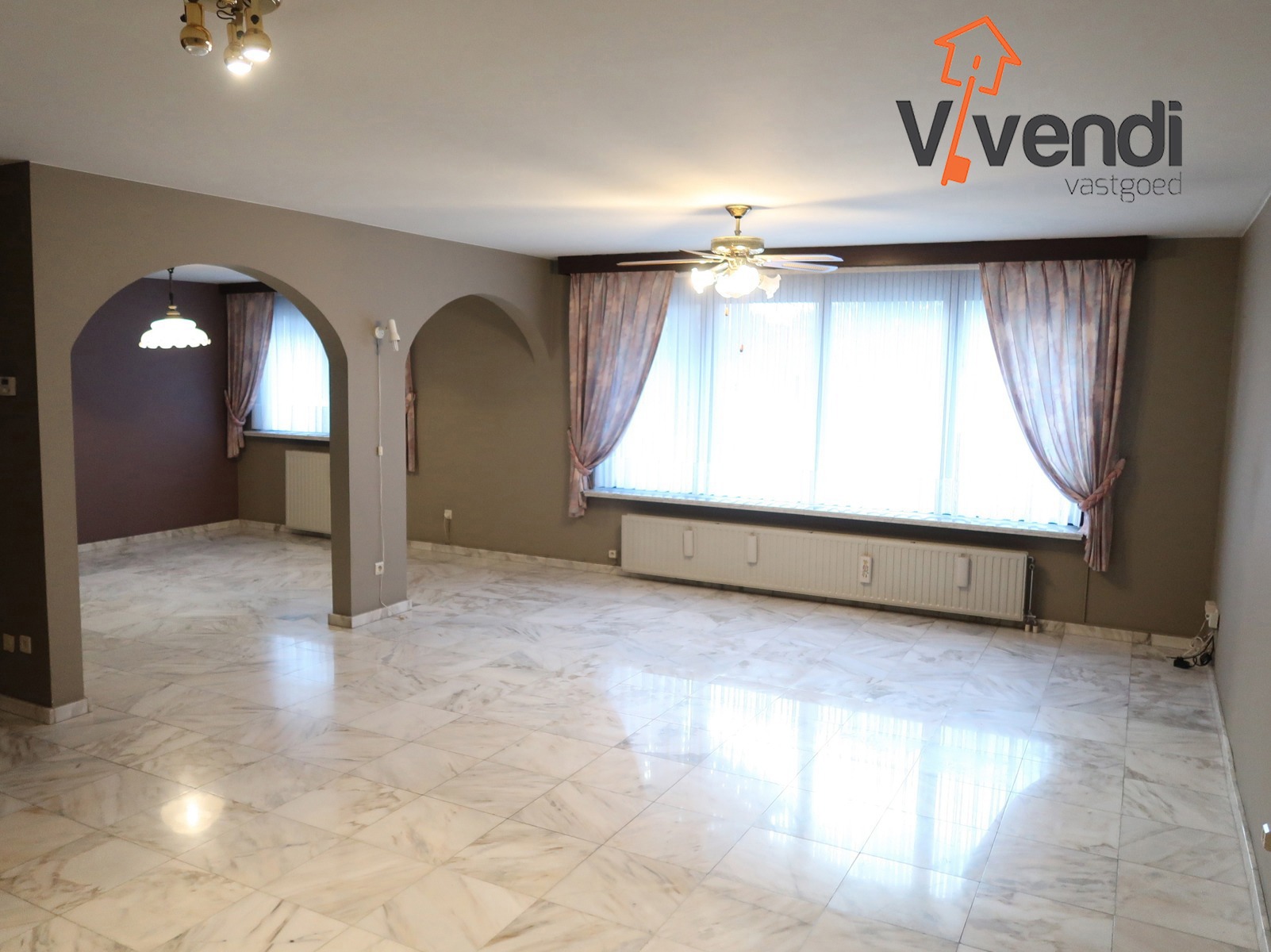 Ruim gelijkvloers appartement met terras en inclusief garagebox! - foto 2