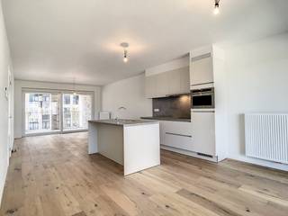 Beautiful, bright two-bedroom apartment for rent with parking space (included in the rental price) in the 'Gallery II' residence on the Sugar Site in Veurne. Very quiet location, but only within walking distance of public transport, shops and the city center.<br /><br />LAYOUT:<br />> First floor:<br />- Entrance hall;<br />- Guest toilet;<br />- Bright living space (32m²) with open kitchen with stove, fridge, etc.<br />- Two covered terraces (8m² and 7m²) accessible via the salon;<br />- Storage (3m²) with washing machine connection;<br />- Bathroom (4m²) with walk-in shower and washbasin;<br />- Two bedrooms (16m² & 10m²)<br /><br />> Underground parking space<br /><br /><br />ADVANTAGES:<br />- Fully painted;<br />- East and west facing terrace;<br />- Parking space included in the rental price;<br />- Spacious bedrooms;<br />- Newly built apartment (VERY energy efficient!)<br /><br />Common costs: + €75, -/month<br />Available from 01/11/2026.<br /><br /><br />Are you interested in this property for rent in Veurne? Go to the website www.dewaele.com, click on the property you want to rent. Via the red button “request your visit”, we ask you to fill out a profile briefly. After that, we will contact you for a visit. Appointments cannot be made by phone.