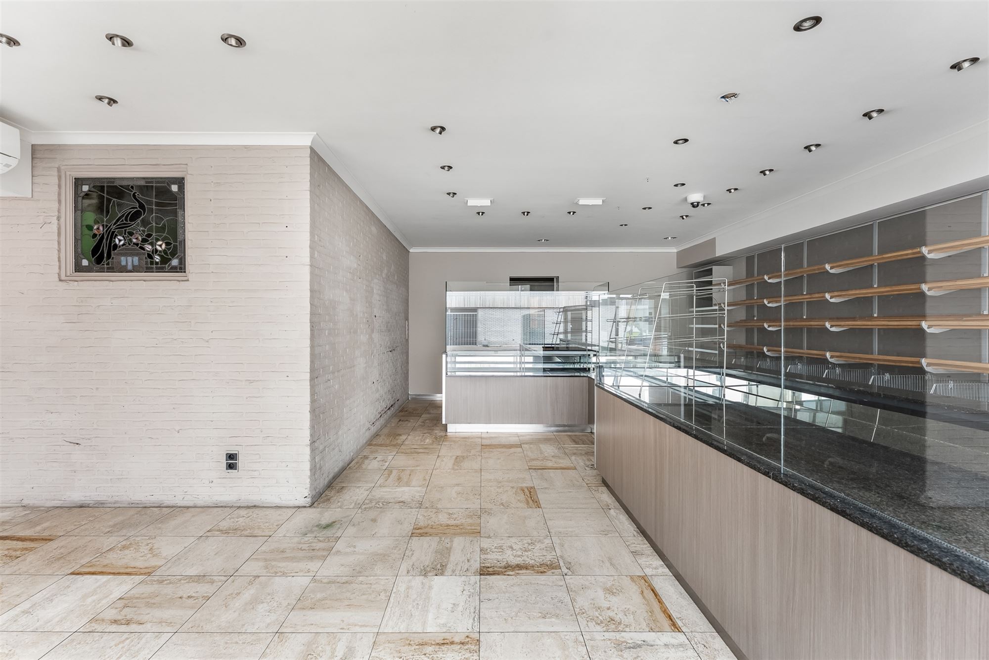 CENTRAAL GELEGEN, RUIM HANDELSPAND MET WOONST (415M²) TE BALEN - foto 3