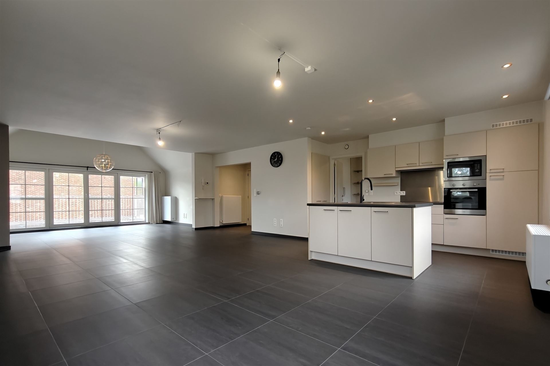 Ruime duplex (197m²) in een residentiële woonwijk te Munsterbilzen - foto 4