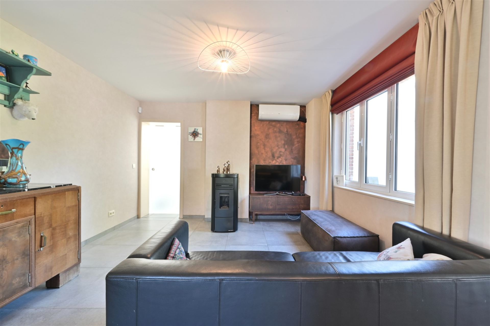 Instapklare open bebouwing met praktijkmogelijkheid, 3 à 4 slaapkamers en zonnige tuin - foto 5