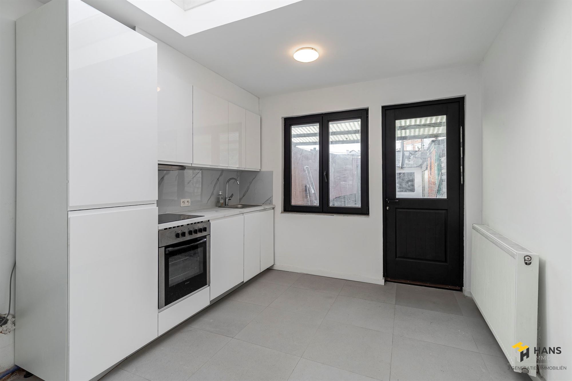 Gerenoveerde confortawoning (80 m²) met 3 slaapkamers en tuin (28 m²) in Deurne. - foto 5