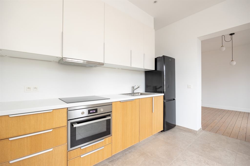 Charmant éénslaapkamer appartement met tuin - foto 4