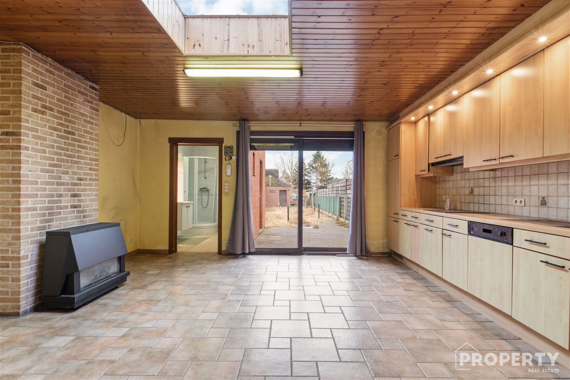 Te renoveren woning met leuke tuin en garage! - foto 4