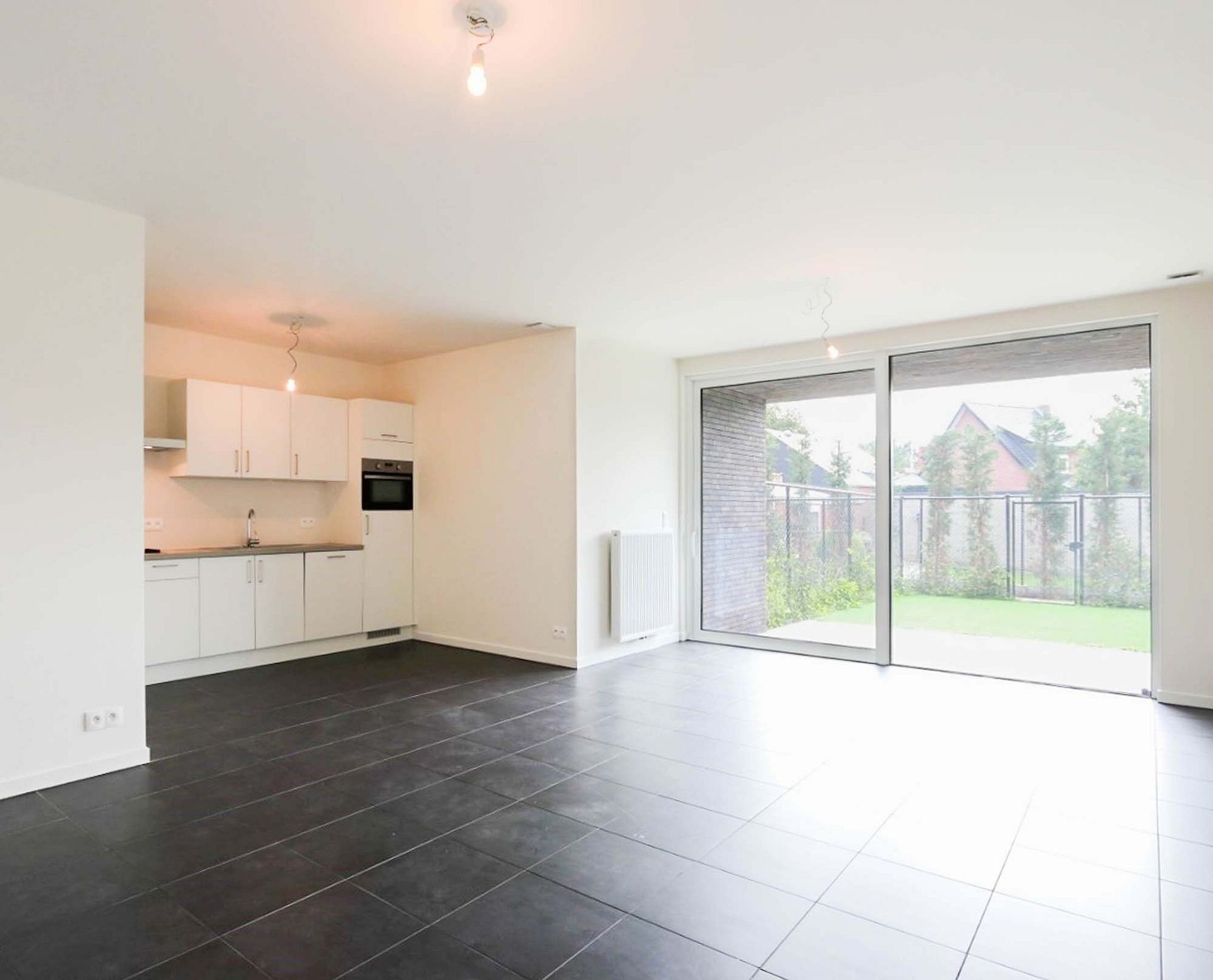 Gelijkvloers appartement met tuin in recent gebouw - foto 5