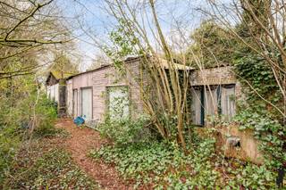 Fantastische gelegen renovatiepand (6% mogelijk!) op ca. 1.708 m² rustig gelegen in Hoogboom tussen de centra van Brasschaat en Kapellen!Het perceel...