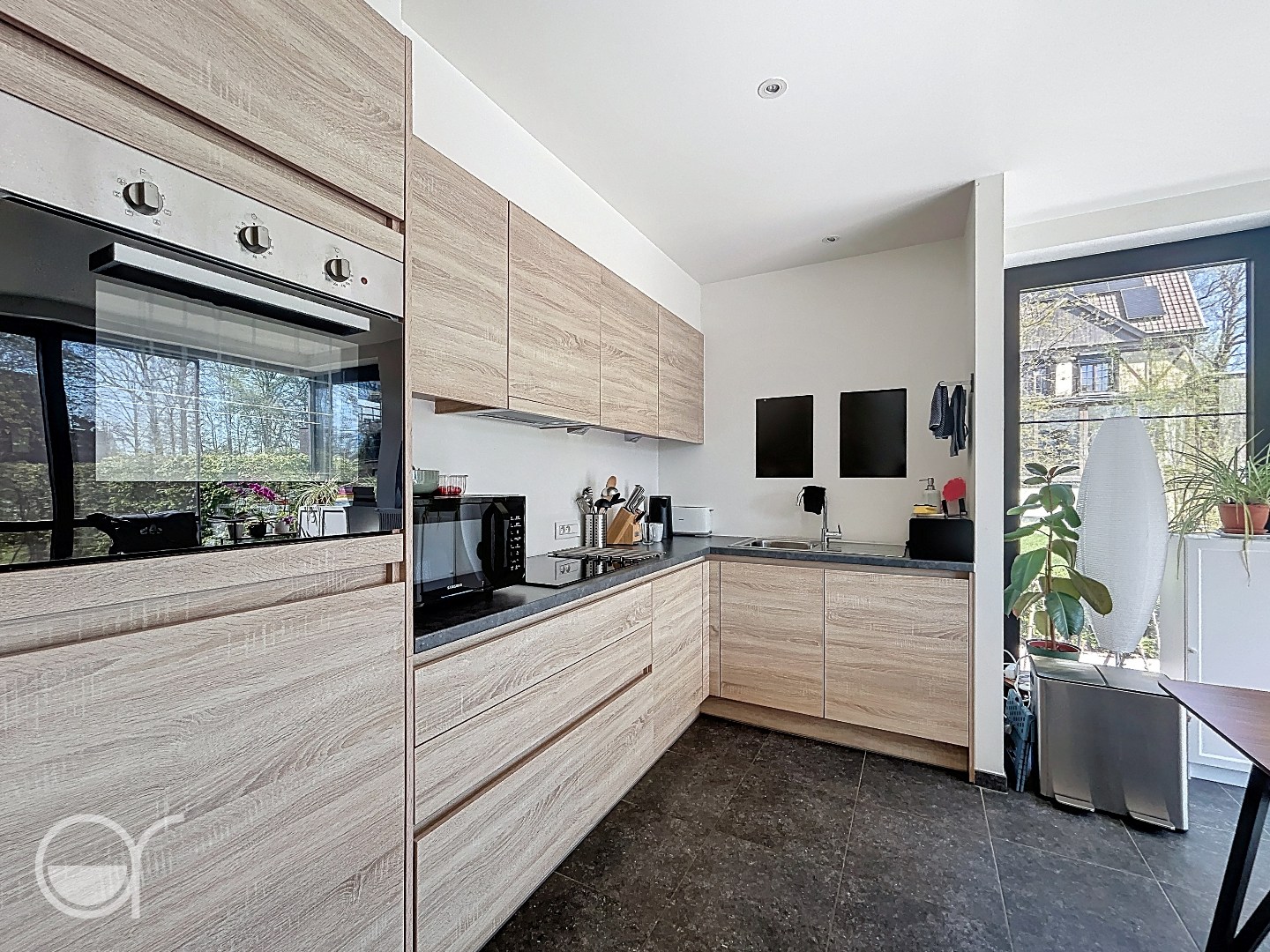 Gelijkvloers appartement met tuin en autostaanplaats - foto 4