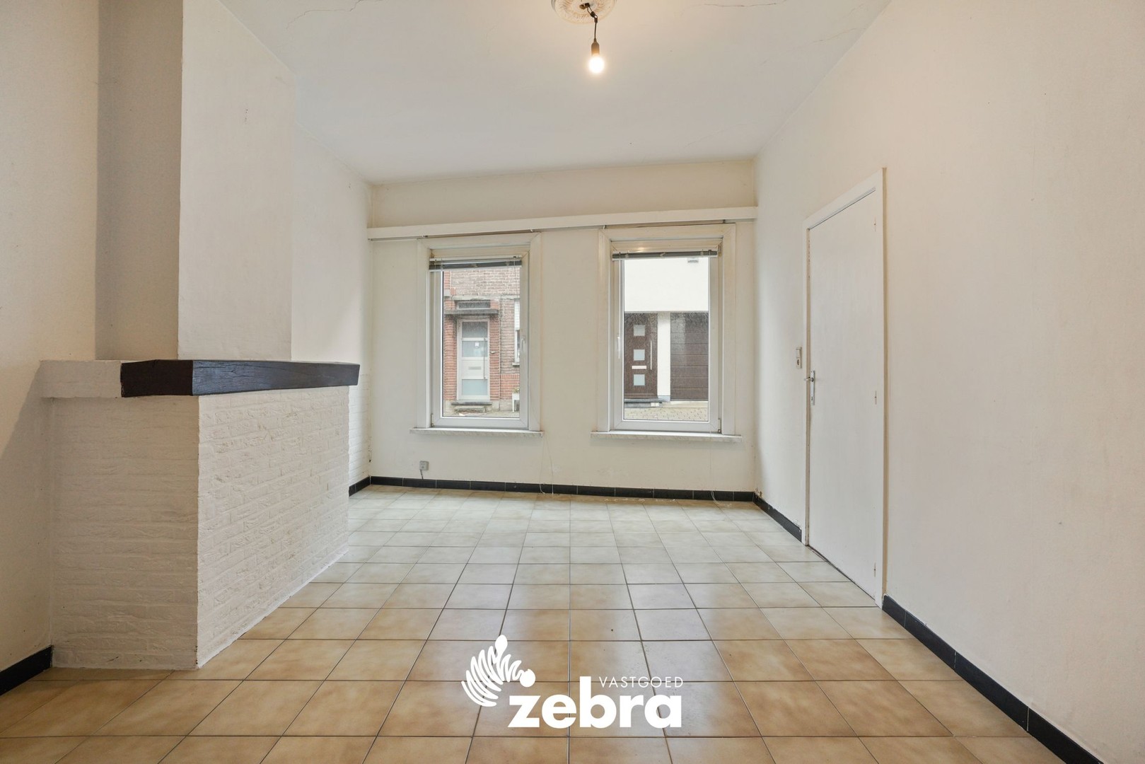 Deels gerenoveerde woning met twee slaapkamers te centrum Tielt! - foto 4