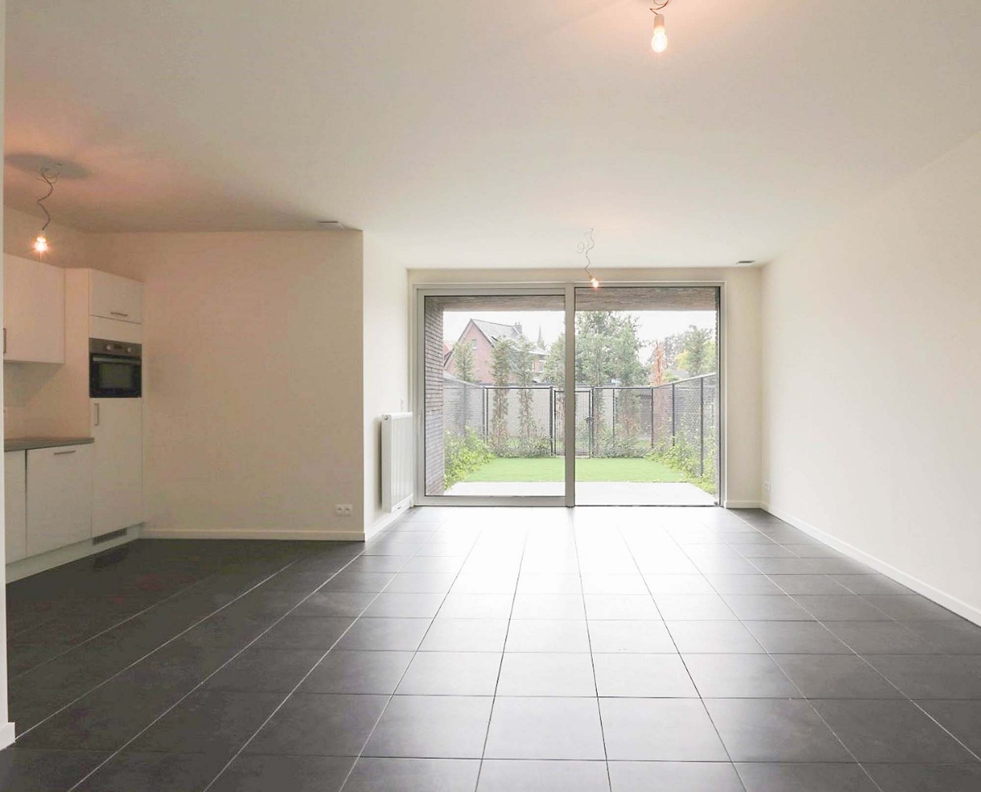 Gelijkvloers appartement met tuin in recent gebouw - foto 4