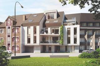 CONTACT <br />Jeroen Vandormael: jeroen@vastgoedvalkenborgh.be | 0498/05.76.72 <br /><br />Aan het iconische Kolonel Dusartplein, waar stadse elegantie en levendige dynamiek elkaar ontmoeten, verrijst Residentie DusartZicht – een prestigieus, kleinschalig nieuwbouwproject bestaande uit slechts 10 exclusieve appartementen.<br />Hier woont u te midden van cultuur, gastronomie en het beste dat Hasselt te bieden heeft, terwijl u geniet van een ongeëvenaard wooncomfort en een verfijnde afwerking. <br /><br />De appartementen, variërend van 62 m² tot 145 m², zijn ontworpen met oog voor ruimte, licht en functionaliteit. Keuze uit 1, 2 of 3 slaapkamers, aangevuld met riante terrassen of private stadstuinen, ondergrondse parkeerplaatsen en royale kelderbergingen. <br /><br />APPARTEMENT 2.3 – tweede verdieping, 2 slaapkamers met terras <br />Opp. appartement: 96 m² <br />Opp. terras: 10,26 m² <br /><br />Gezellig en stijlvol 2-slaapkamerappartement op de tweede verdieping van Residentie DusartZicht. Het zuidelijk georiënteerde terras van ruim 10 m² vormt een ideale plek om in alle rust te genieten van de zon en het uitzicht. <br />Dankzij de grote raampartijen met fijne raamprofielen wordt de leefruimte overspoeld met natuurlijk licht, wat zorgt voor een aangename en luchtige sfeer. Het interieur is tot in detail vormgegeven door de binnenhuisarchitecten van In-Lijn, met aandacht voor de juiste verhoudingen, zichtassen en een optimale benutting van de ruimte. <br /><br />BEN-APPARTEMENTEN <br />Alle wooneenheden voldoen aan de BEN-norm en zijn uitgerust met de meest geavanceerde technieken: <br />- geothermische warmtepompen en zonnepanelen <br />- vloerverwarming in combinatie met Clima-Channels <br />- zon- en geluidswerend glas <br />- waterrecuperatiesysteem <br />- camerabewaking en inbraakwerend glas op het gelijkvloers voor maximale veiligheid <br /><br />Keukens, badkamers en sanitair worden uitgevoerd in hoogwaardige materialen, zorgvuldig geselecteerd voor hun esthetiek én duurzaamheid. U bepaalt zelf de stijl en afwerking, zodat uw appartement volledig uw persoonlijke signatuur draagt. <br /><br />TROEVEN <br />- unieke ligging aan het Kolonel Dusartplein <br />- winkels, restaurants en culturele hotspots op wandelafstand <br />- uitstekende bereikbaarheid met openbaar vervoer <br />- 5 jaar vrijstelling op onroerende voorheffing (BEN-appartementen) <br />- ondergrondse parkings en ruime bergingen <br />- kleinschalige residentie met slechts 10 appartementen <br />- high-end afwerking en luxueuze uitstraling <br />- standingvolle gevel in natuursteen <br />- doordachte indelingen en overvloedige lichtinval <br /><br />PRIJZEN <br />- 1-slaapkamerappartementen vanaf € 325.000 excl. btw en kosten <br />- 2-slaapkamerappartementen vanaf € 472.000 excl. btw en kosten <br />- 3-slaapkamerappartementen VERKOCHT <br />*Dit project komt in aanmerking voor het verlaagd btw-tarief van 6%.<br />Meer informatie over de voorwaarden en hoe u hiervoor in aanmerking kunt komen, vindt u op de website van de FOD Financiën:<br />https://financien.belgium.be/nl/particulieren/woning/renovatie/btw-tarief-6-procent<br /><br />U kunt uiteraard ook contact opnemen met ons kantoor voor bijkomende toelichting. <br /><br />Residentie DusartZicht is niet zomaar een plek om te wonen – het is een statement van stijl, comfort en levenskwaliteit. <br /><br />Meer info: www.vastgoedvalkenborgh.be of via 0498/05.76.72