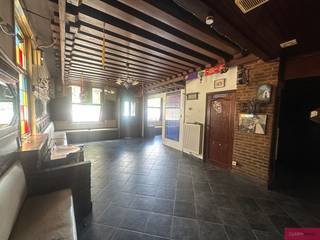 <p><span>Commercial property in need of renovation with a sunny terrace</span></p><p><span>Are you looking for a property with plenty of potential? Then this spacious commercial building with integrated living quarters is definitely worth a visit. Thanks to the combination of commercial space and living quarters, this property is ideal for self-employed professionals, restaurant owners, investors, or anyone who wants to combine living and working.</span></p><p><span>The ground floor has a usable area of no less than 165 m² and served as a café for many years. The former café area is located at the front, while the center features restrooms and a space for a kitchen. At the rear is a 52 m² multipurpose room with a separate restroom. A major advantage is the separate side entrance, which provides completely independent access to the rear room.</span></p><p><span>Adjacent to this is a terrace/garden of approximately 74 m².</span></p><p><span>The residence on the first floor comprises a living area, two bedrooms, and a bathroom. On the second floor is an insulated attic, which offers numerous possibilities for future conversion.</span></p><p><span>The property also features a basement of approximately 17 m².</span></p>