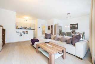 Quartier Marcel Thiry, bel appartement au rez-de-chaussée de ± 98m² habitable, composé d'un hall d'entrée de ± 6m², d'un beau living de ±...