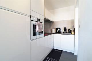 Centraal en rustig gelegen 2-slaapkamerappartement in een mooie straat in Avelgem, vlakbij winkels, apotheek, cultuur en natuur (Scheldemeersen op...