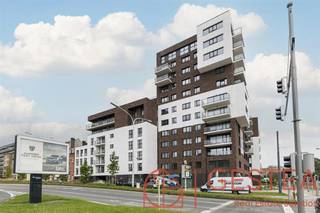 1140 EVERE (36 Jules Bordet Ave.) - Located just outside Brussels, in a new residential complex, this beautiful, warm, and bright apartment will...
