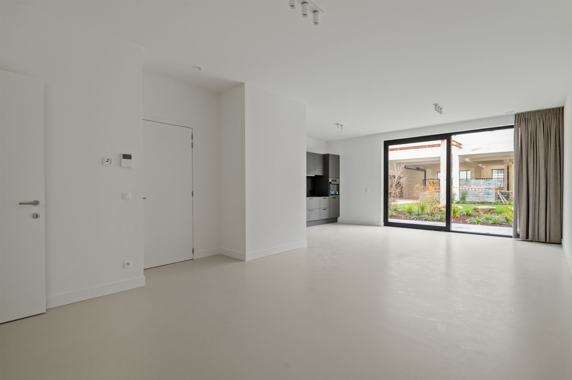 gelijkvloers nieuwbouw 2slk appartement met tuin - foto 4