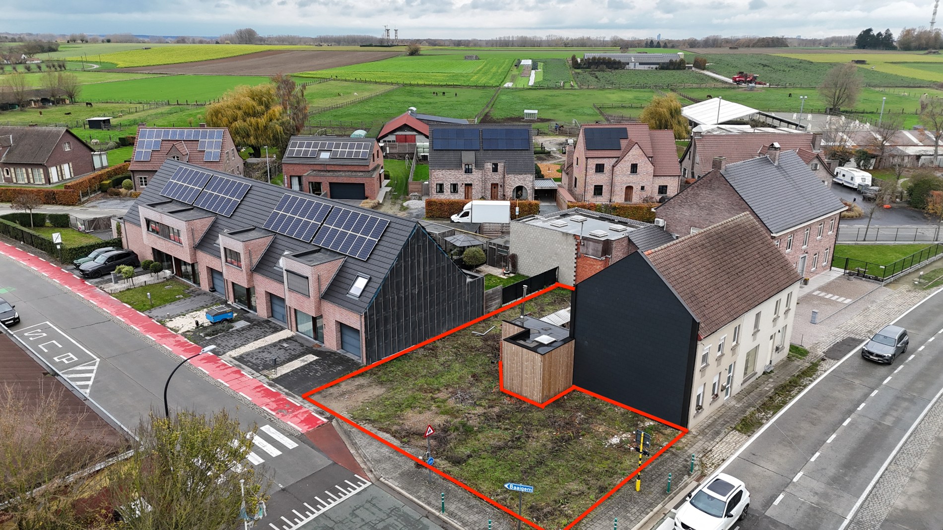 Bouwgrond op een interessante hoeklocatie in Baaigem - foto 1