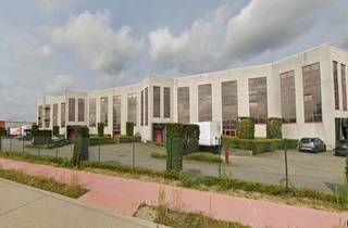 Logistieke site van 12.928m² in industriegebied met uitbreidingsmogelijkheden van minstens 10 000 m2 of meer met verhard terrein, laadkades,...