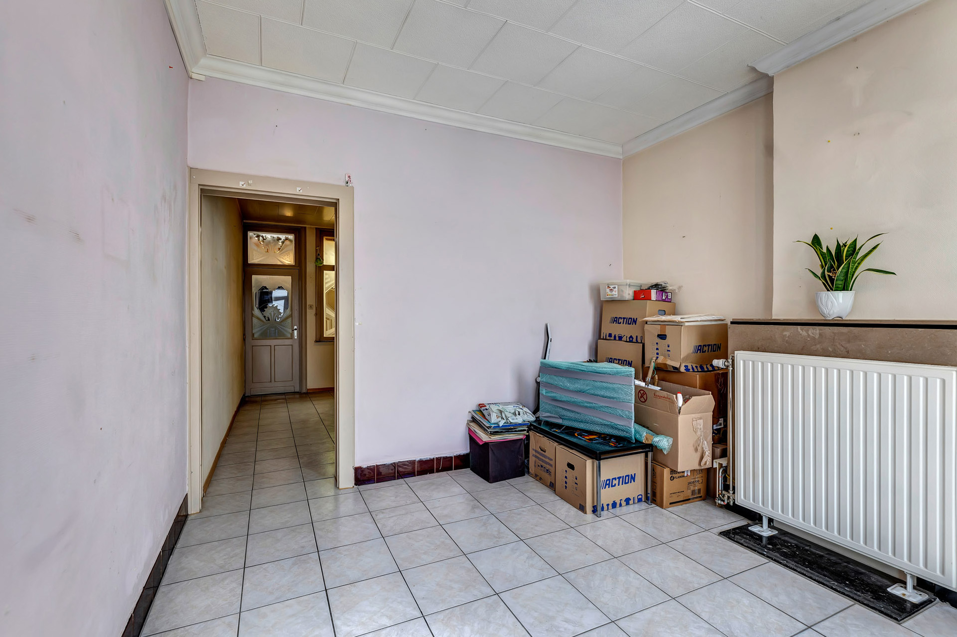 Te renoveren rijwoning met tuin - foto 2