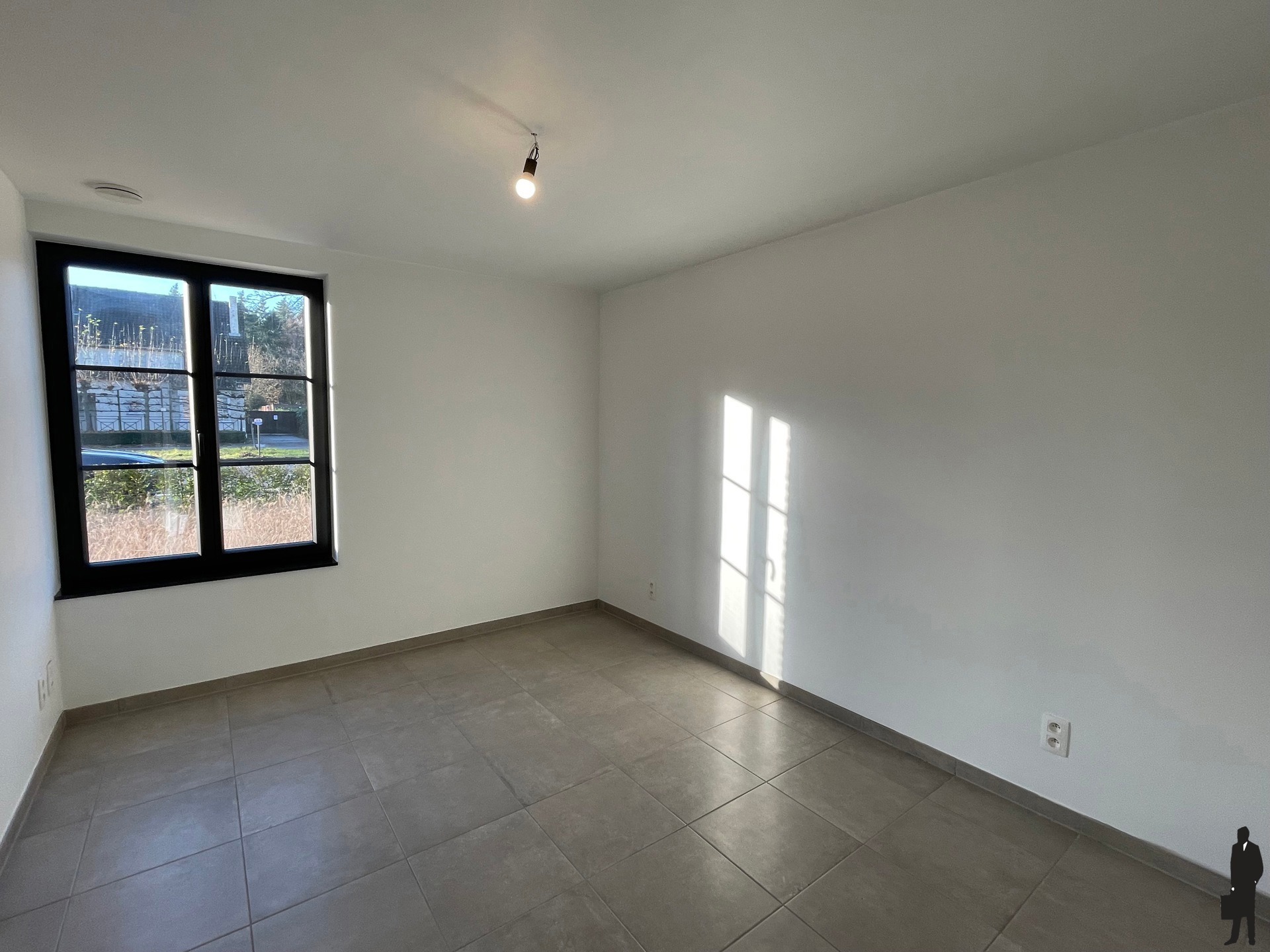 Gelijkvloers appartement met ondergrondse autostaanplaats - foto 5