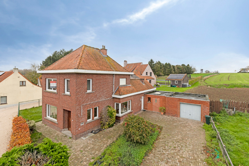 Charmante wonig met tuin en zicht - foto 1