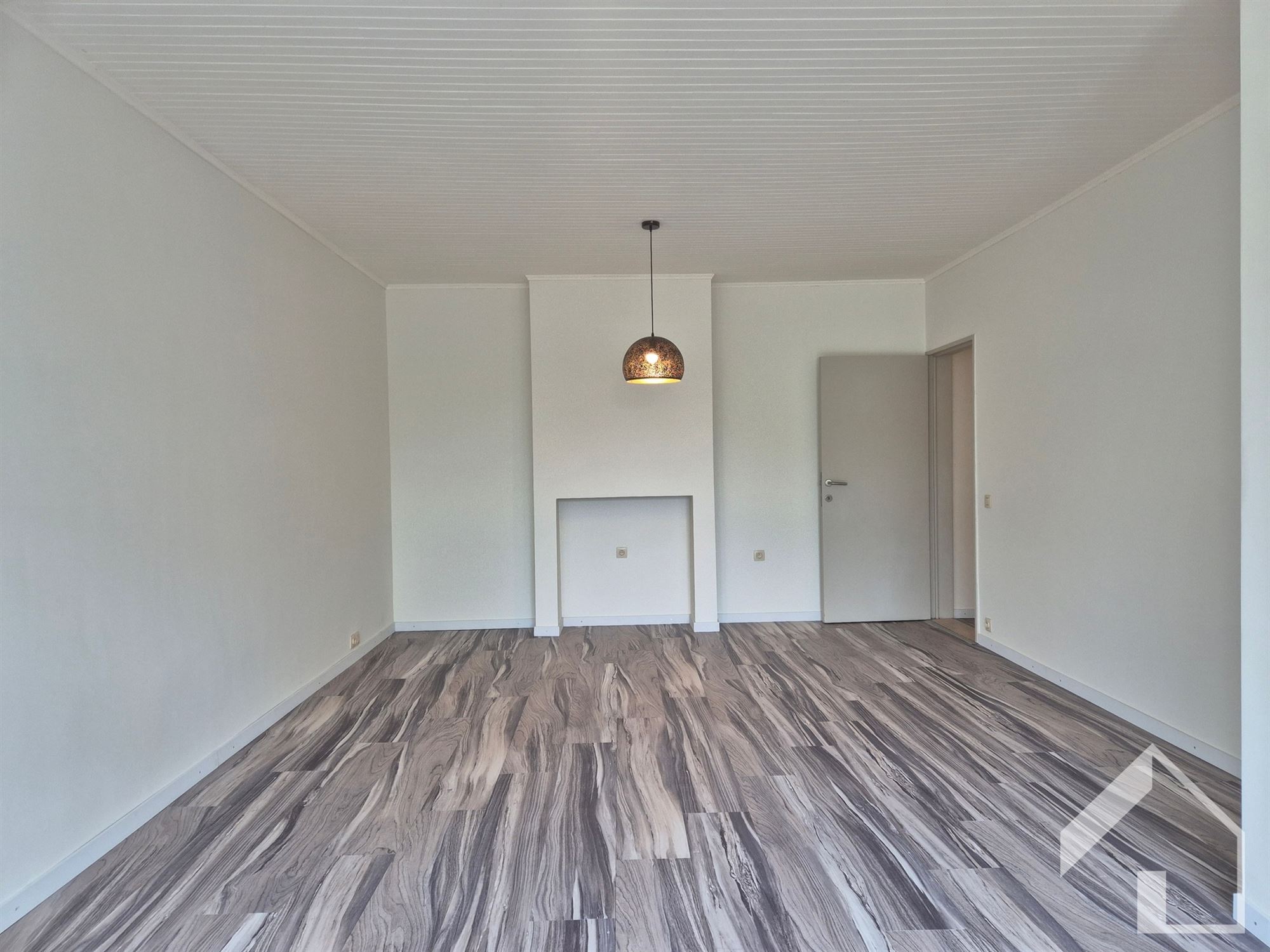 gelijkvloersappartement met 2 slaapkamers, tuin en garage - foto 4