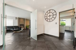 Instapklare woning met tuin, garage en kelderruimte in Sint-Katelijne-WaverBESCHRIJVING:Instapklare woning met moderne uitstraling en praktische...