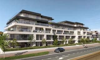 Dit appartement maakt deel uit van het nieuwbouwproject 'Residentie One Harbour'.<br /><br />Het appartement bevindt zich op de tweede verdieping en werd ingedeeld als volgt:<br />Inkom, toilet, berging, keuken, leefruimte met aanpalend terras, 2 slaapkamers en een badkamer. <br />De terrassen zijn zuidwestelijk/noordoostelijk georiënteerd. <br /><br />Verplicht aan te kopen garagebox of staanplaats niet in de prijs inbegrepen. <br /><br />Appartement: 88 m²<br />Terrassen: 23 m²